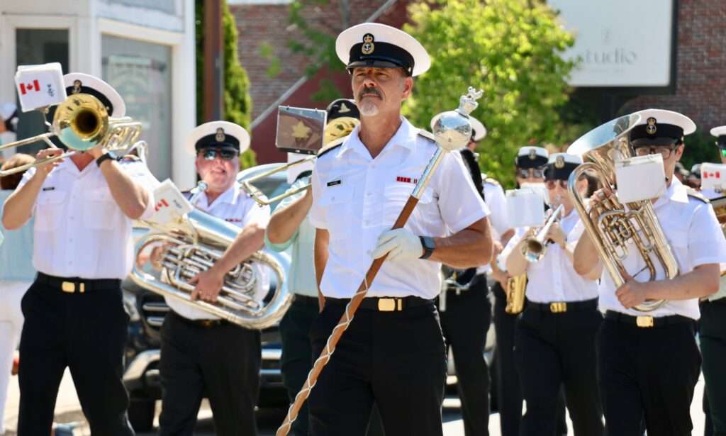 The Stadacona Band of the Royal Canadian Navy marches in the Avon River Days Grand Street Parade in Windsor, Nova Scotia, sponsored by the Windsor Township Business Association.